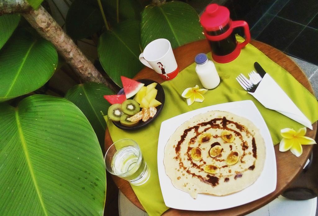 Апартаменты The Patio Yogya Джокьякарта Экстерьер фото