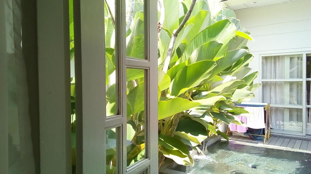 Апартаменты The Patio Yogya Джокьякарта Экстерьер фото